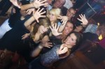 3307788-group-of-young-people-dancing-and-enjoying-inside-a-night-club
